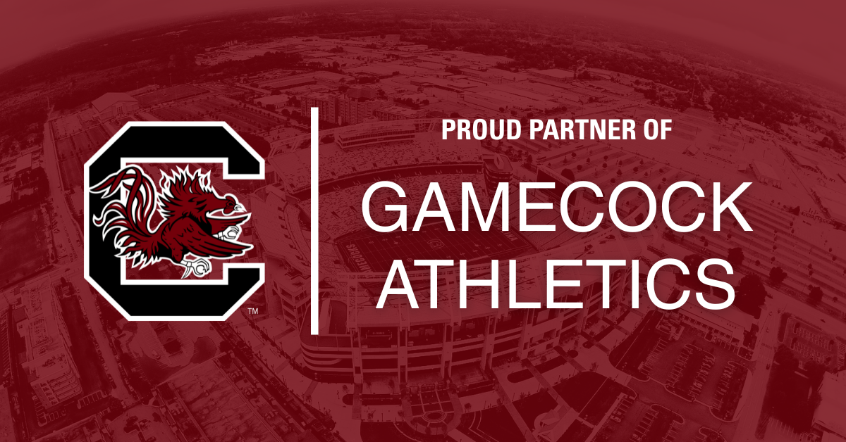 image of Williams Brics Stadium with garnent tint over it and USC Gamecocks logo pictured on the left and text saying "proud partenr of Gamecock Athletics"